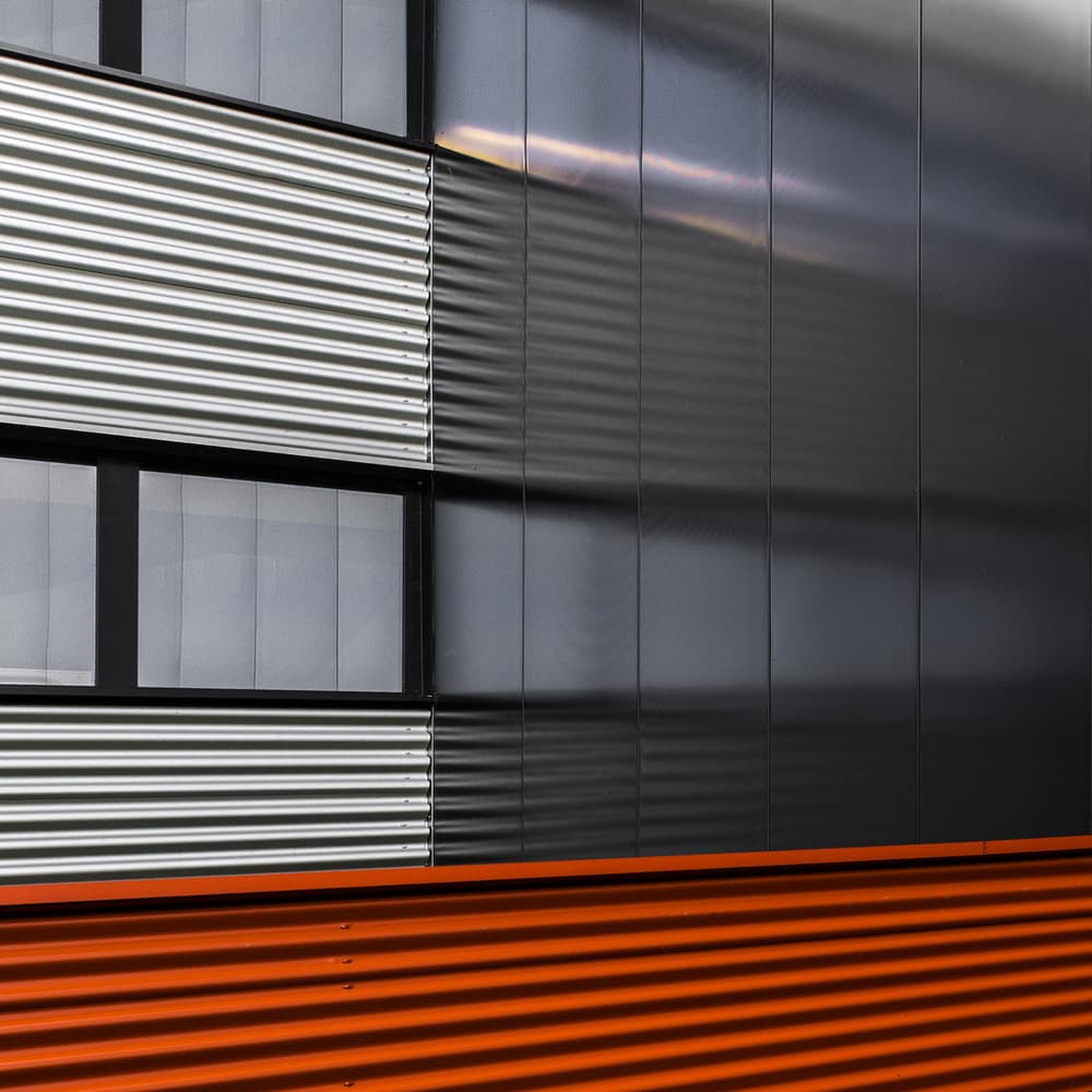 Orange Metal Facade by Luc Vangindertael (laGrange) — canvas wall art