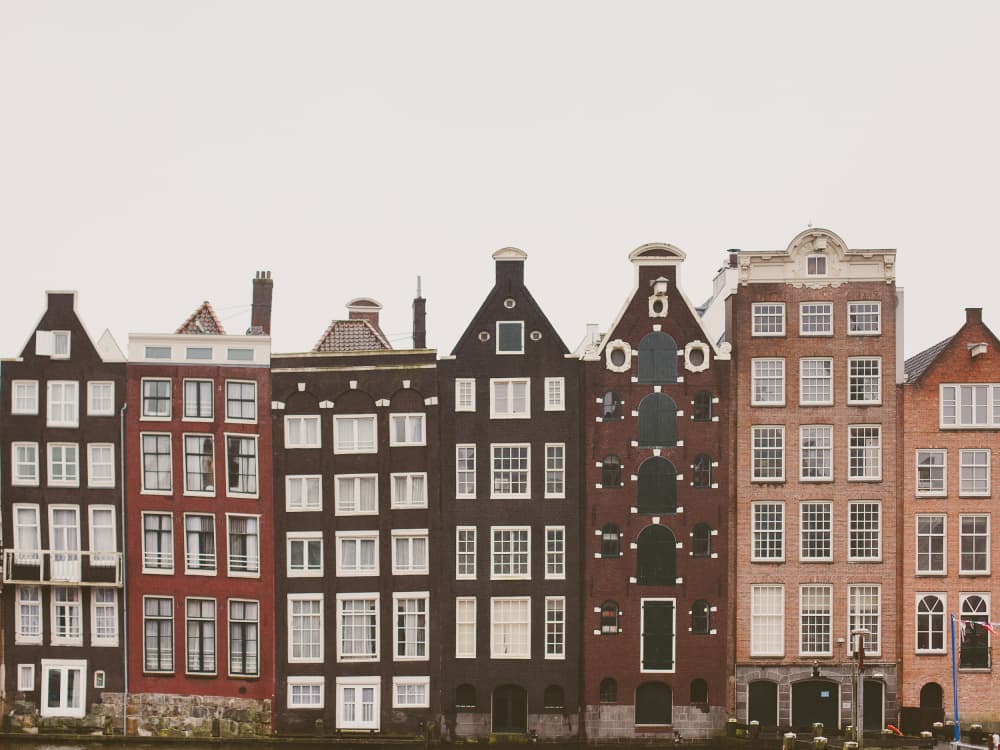 Historic Amsterdam Canal Houses by Claudia Casal — canvas wall art