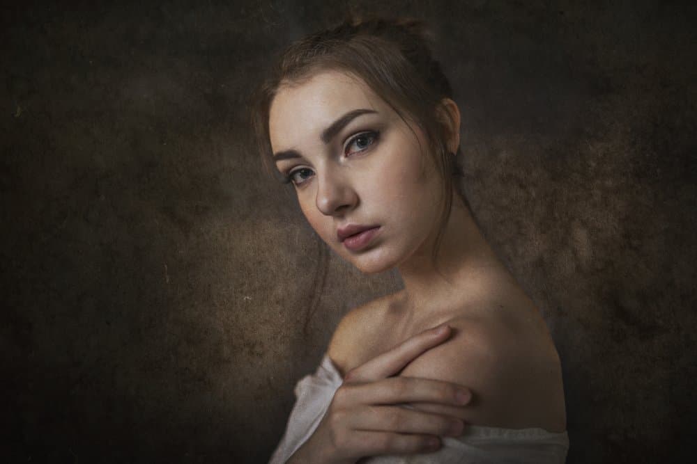 Pensive Young Woman by Lita Pratikto — canvas wall art