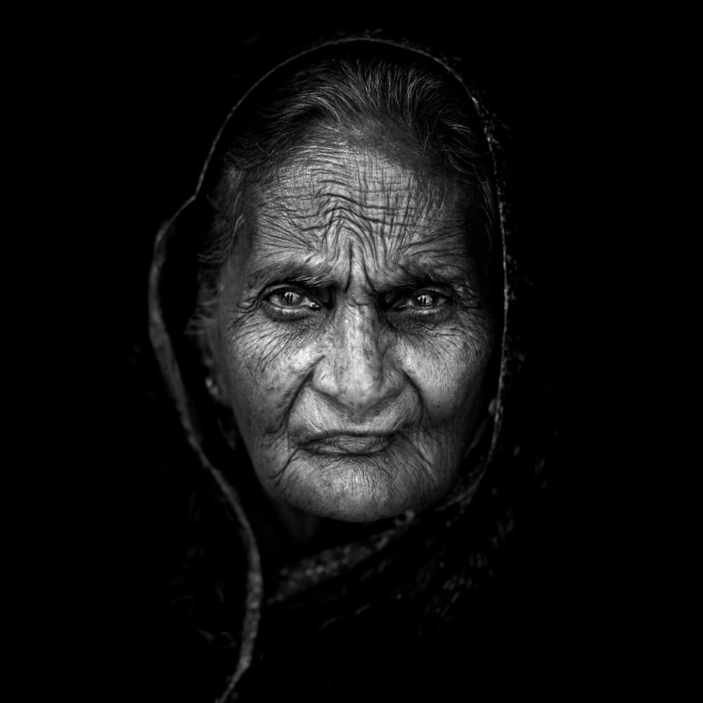 Intense Elderly Gaze by Mohammed Baqer — canvas wall art