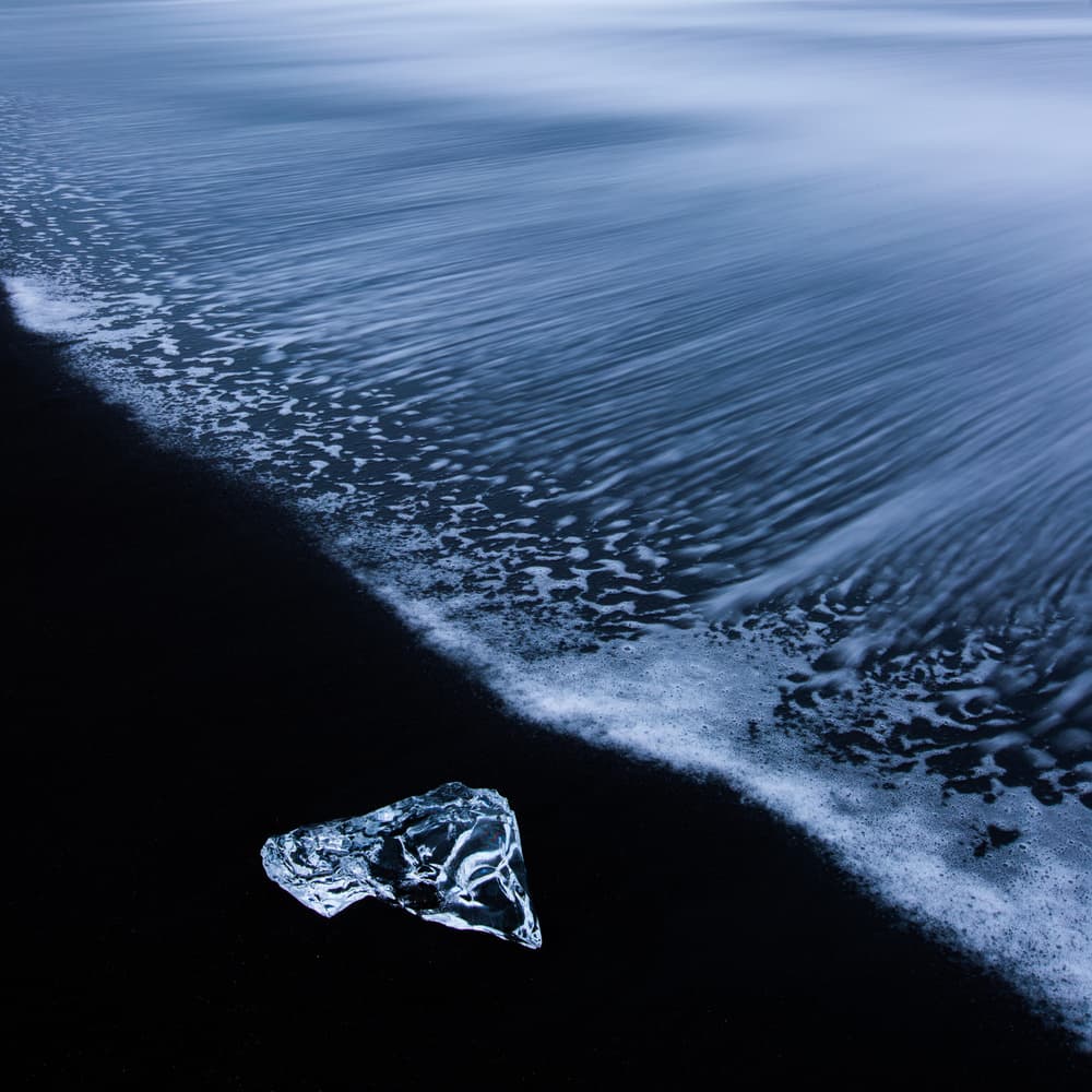 Ice on Black Sand by Richard Liu — canvas wall art