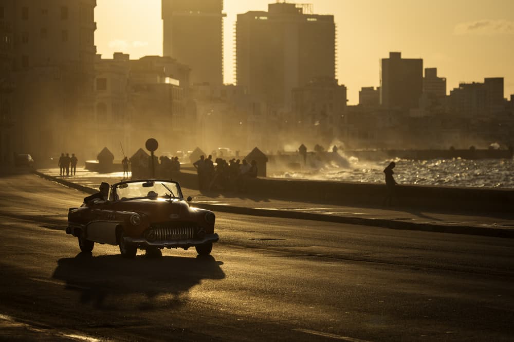 Vintage Convertible City Sunset by Dan Mirica — canvas wall art