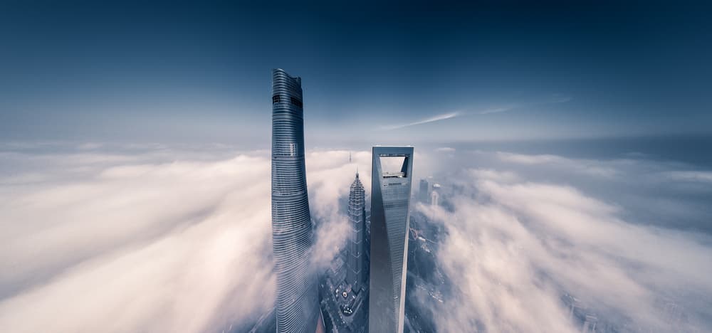 Majestic Skyscrapers Above Clouds by Vview Chen — canvas wall art
