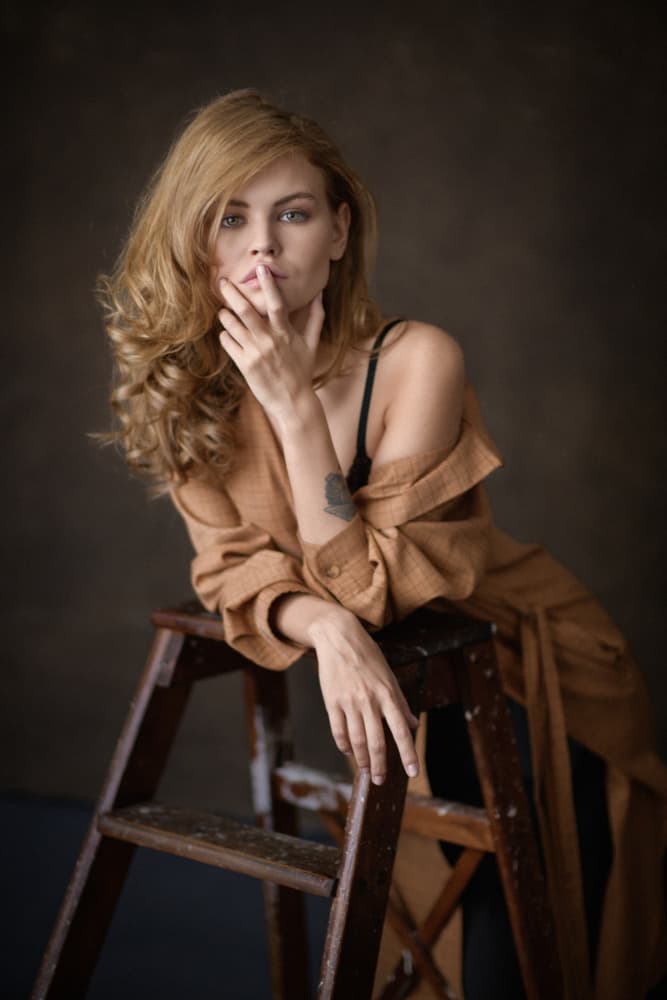 Pensive Blonde Woman by Chris Bos — canvas wall art