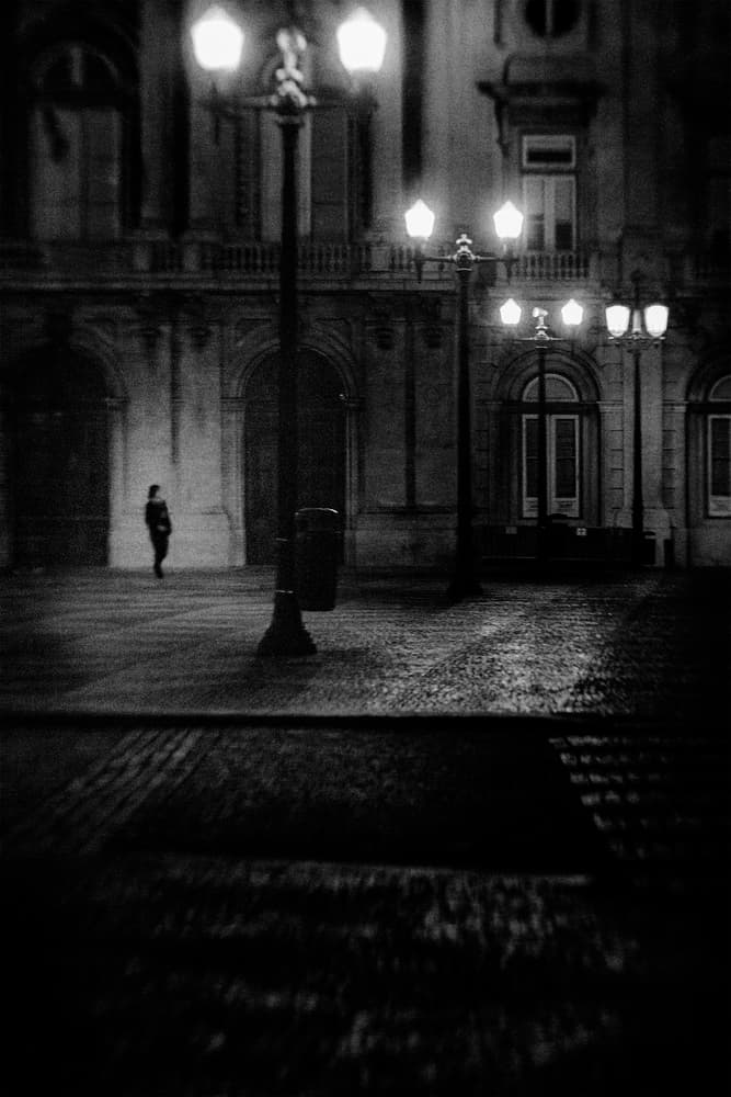 Lone Figure City Night by Laura Mexia — canvas wall art