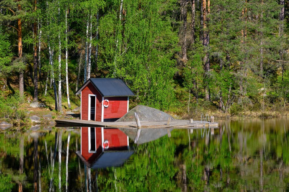 Red Lakeside Cabin by Geertjan Plooijer — canvas wall art