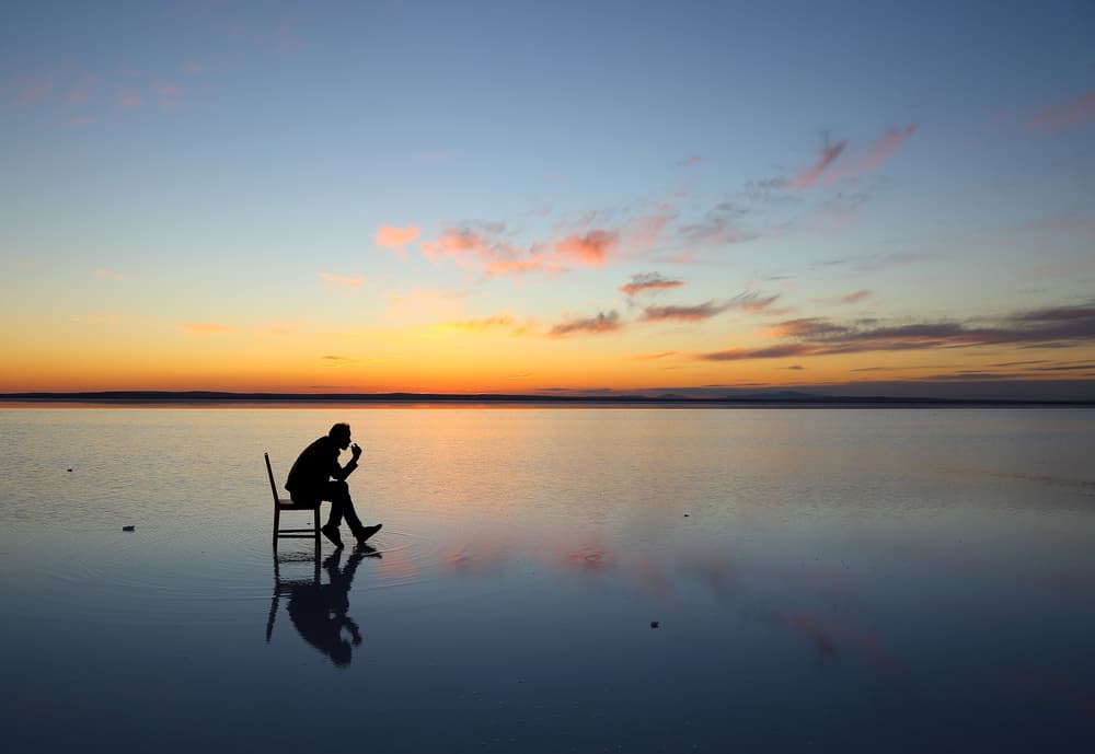 Pensive Sunset Reflection by Mustafa Binol — canvas wall art