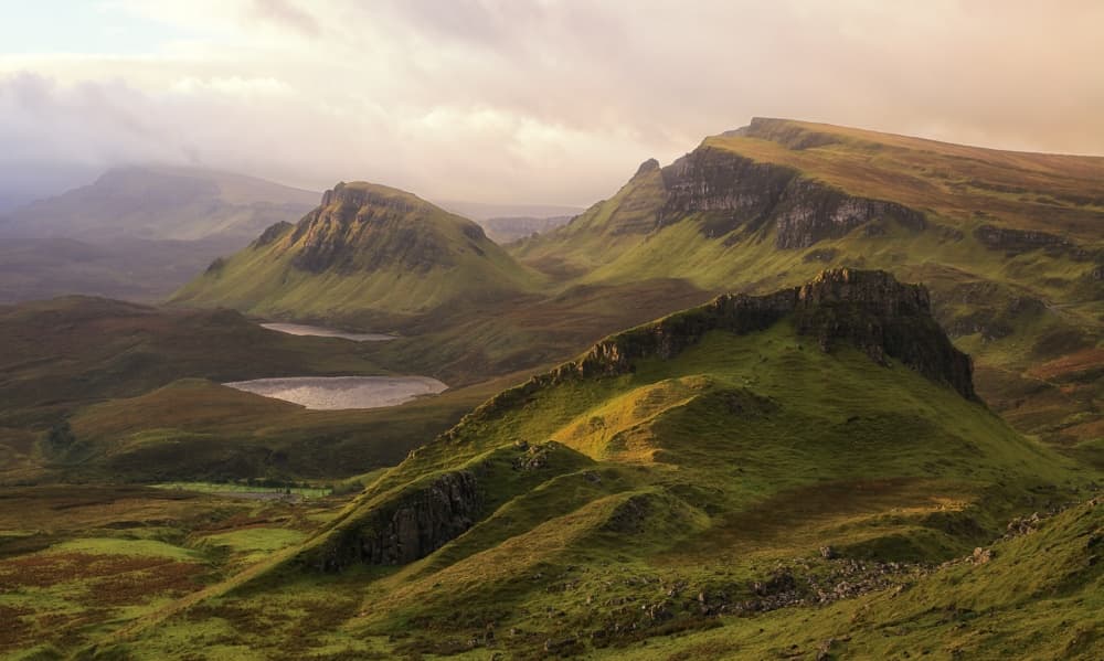 Highland Peaks Golden Light by Margarita Chernilova — canvas wall art