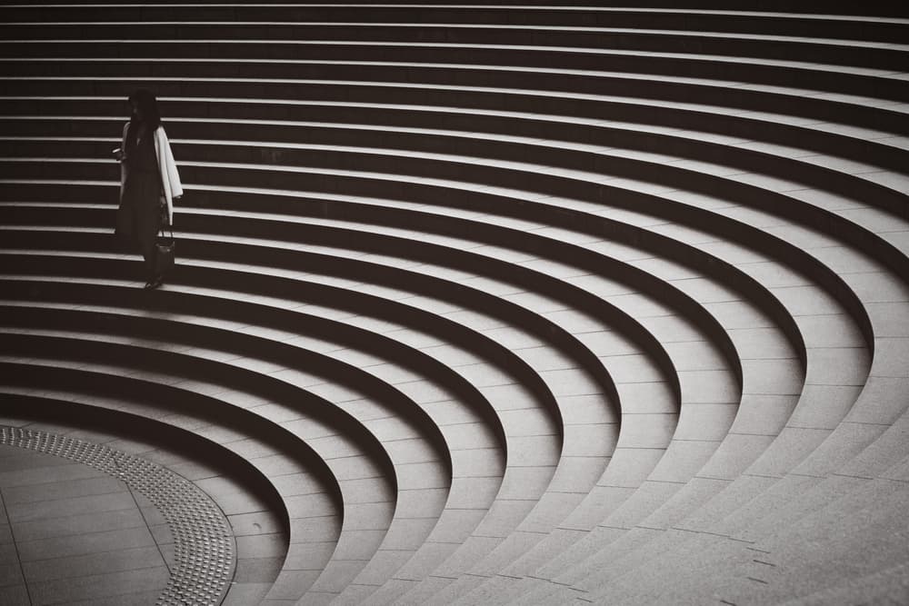 Solitary Figure Curved Stairs by Reiko kiri — canvas wall art
