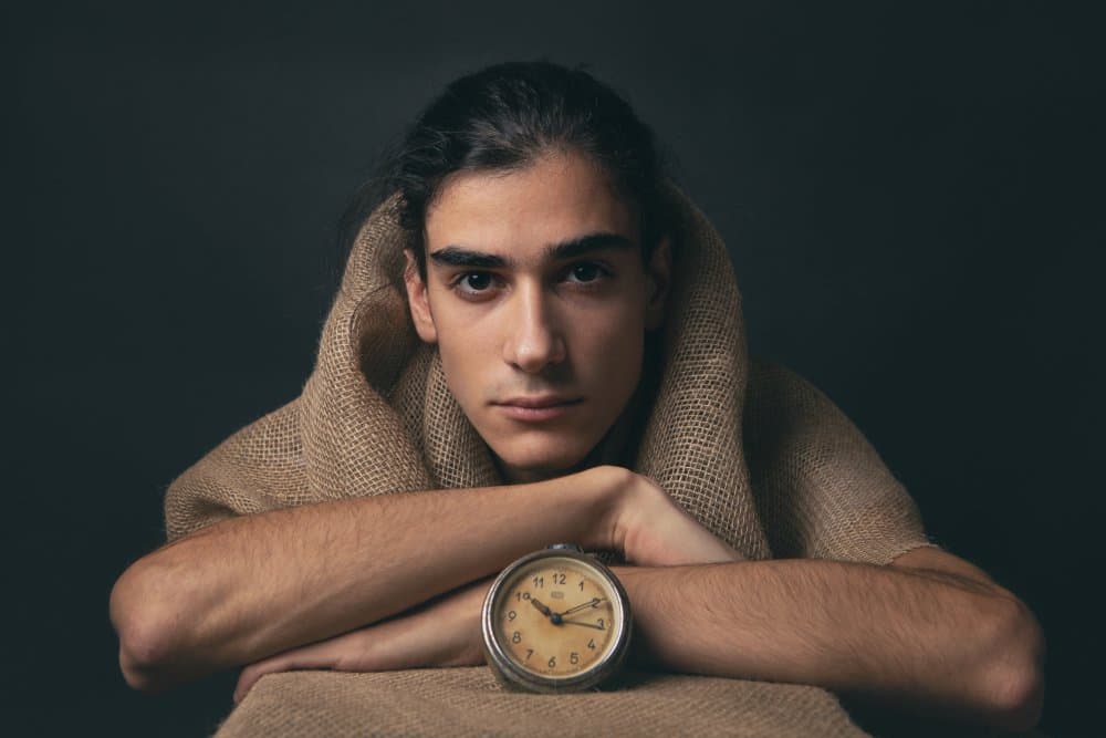 Contemplative Man With Clock by Mihai Bogdan R — canvas wall art