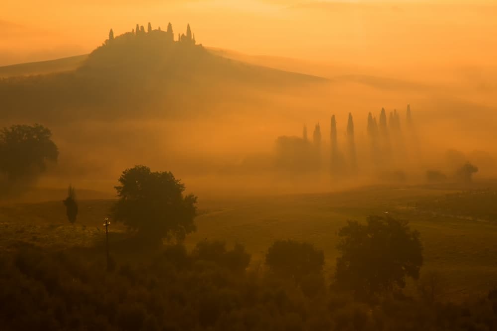 Golden Tuscan Morning Fog by Massimo Della Latta — canvas wall art