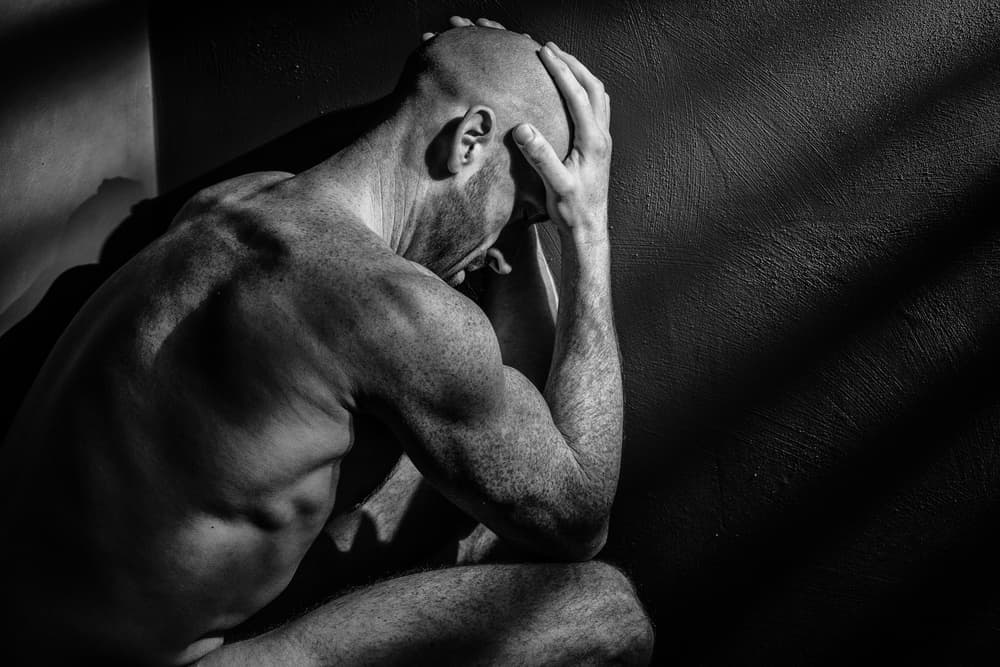 Pensive Man In Shadow by Colin Dixon — canvas wall art