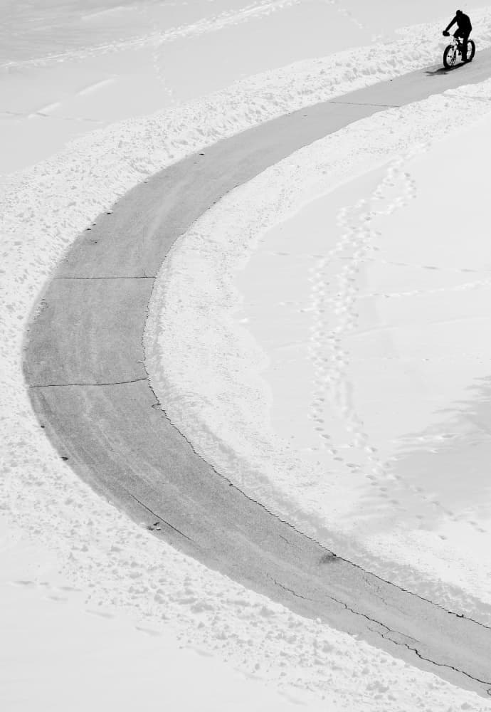 Snowy Winter Bike Ride by Jian Wang — canvas wall art