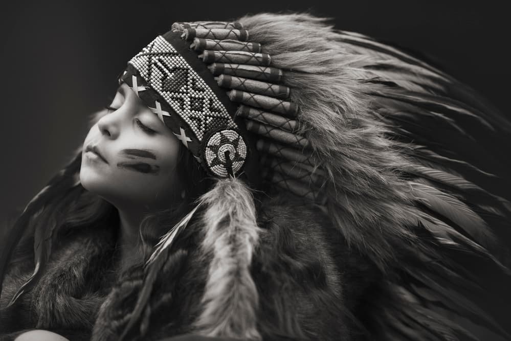 Child in Feather Headdress by Carmit Rozenzvig — canvas wall art