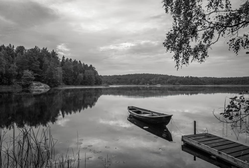 Boat on Still Water by Christian Lindsten — canvas wall art