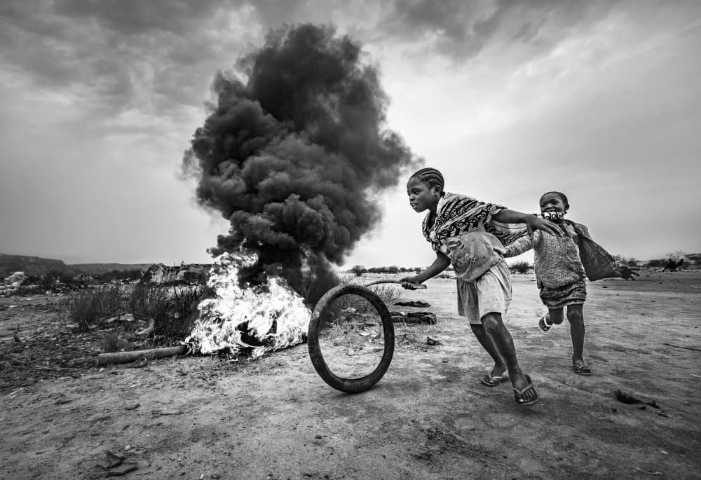 Children Playing By Fire by João Coelho — canvas wall art
