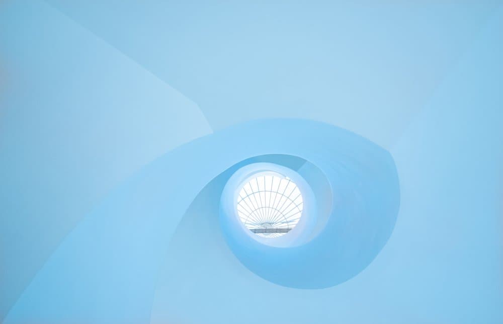 Blue Spiral Light Tunnel by Peiyin Wang — canvas wall art