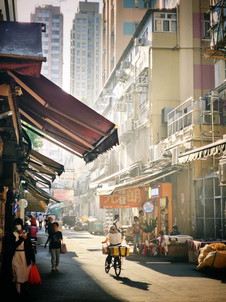 Sunlit Hong Kong Street by Tong Ho Chung Howard — canvas wall art