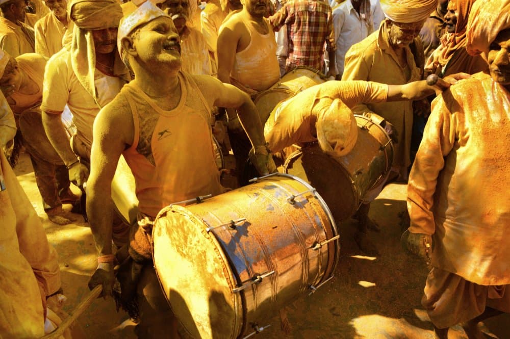 Yellow Powder Drummers by Chetan Shashi Suresh Dodwad — canvas wall art