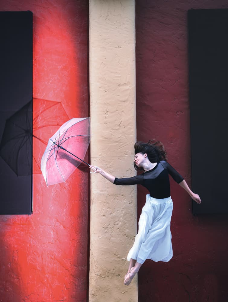Floating Umbrella Ballet by Catherine Wang — canvas wall art