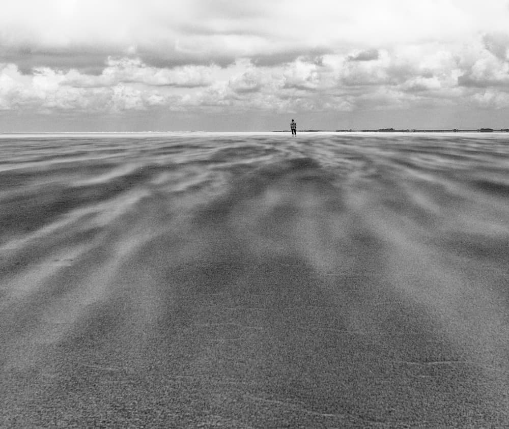 Lone Figure on Horizon by Andreas Timar — canvas wall art