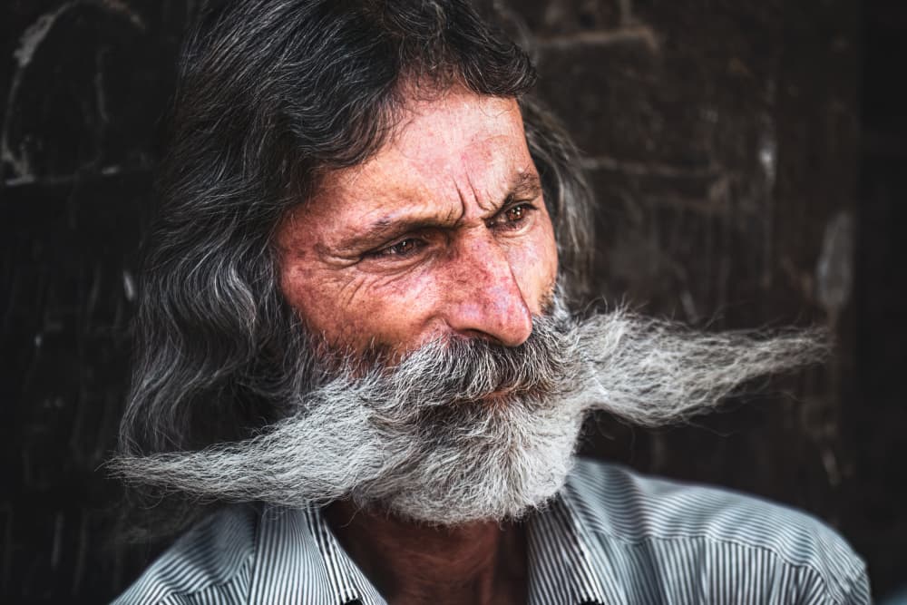 Intense Moustached Man by Marco Tagliarino — canvas wall art