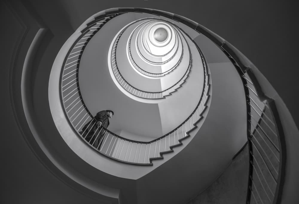 Person On Spiral Staircase by Roelof de Hoog — canvas wall art