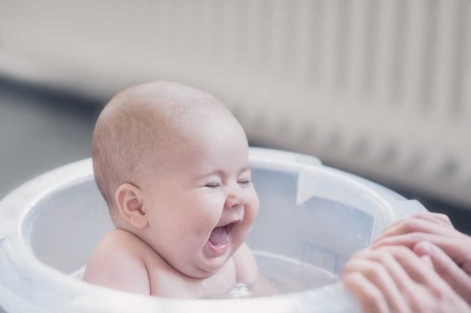 Laughing Baby Bath by Christoph Hessel — canvas wall art