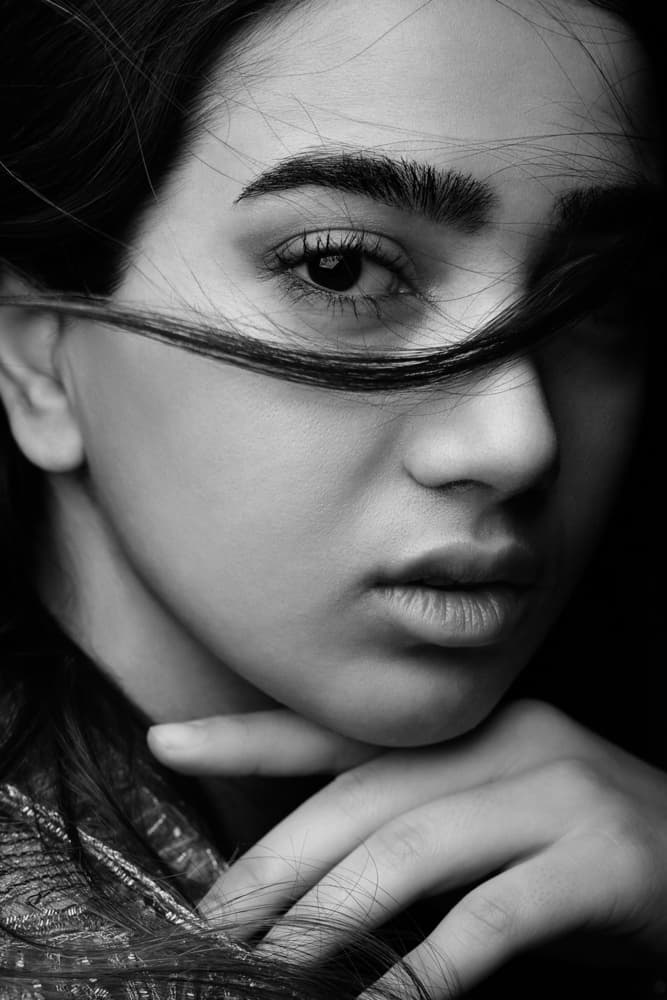 Contemplative Woman's Gaze by Mehdi Mokhtari — canvas wall art