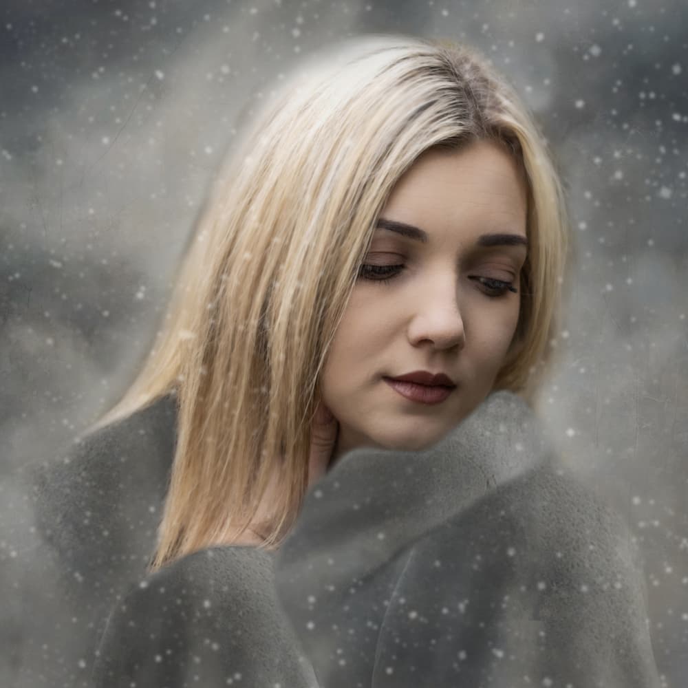 Pensive Blonde Winter Snow by Ewa Całkosińska-Kajzer — canvas wall art