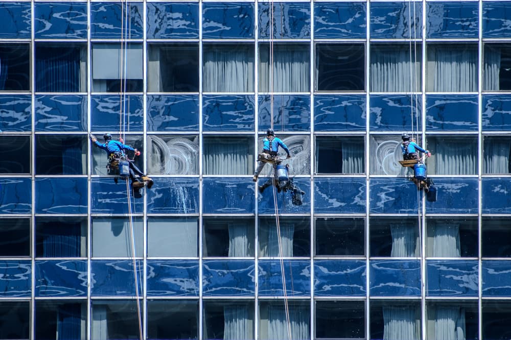 Skyscraper Window Washers by Marek Lapa — canvas wall art