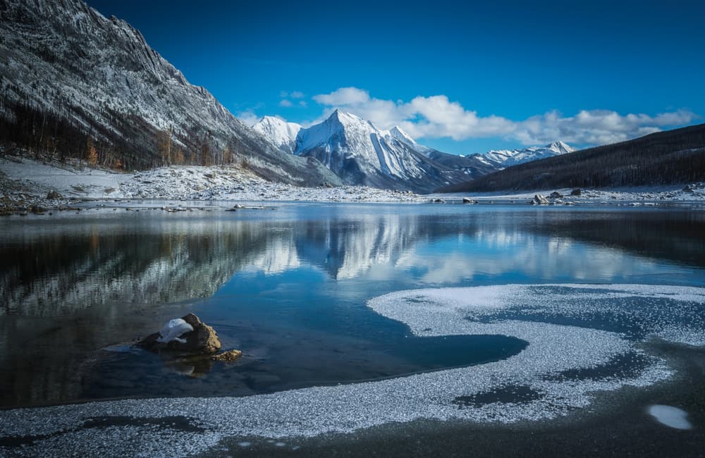 Snowy Mountain Lake Reflection by Yongnan Li （李永男） — canvas wall art