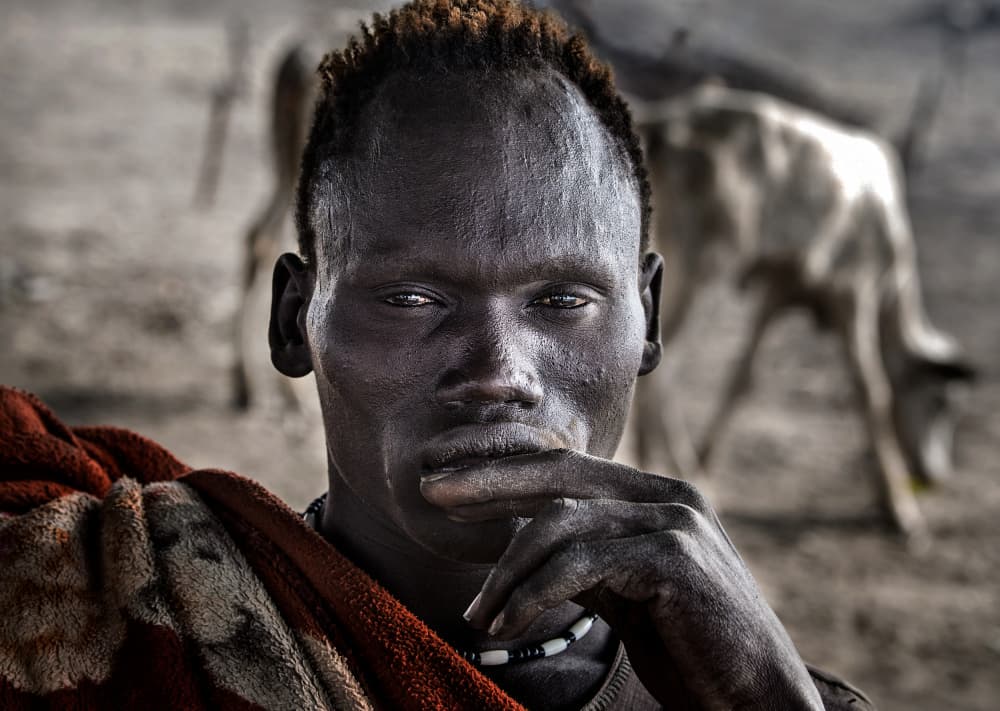 Intense Dinka Man Portrait by Joxe Inazio Kuesta Garmendia — canvas wall art