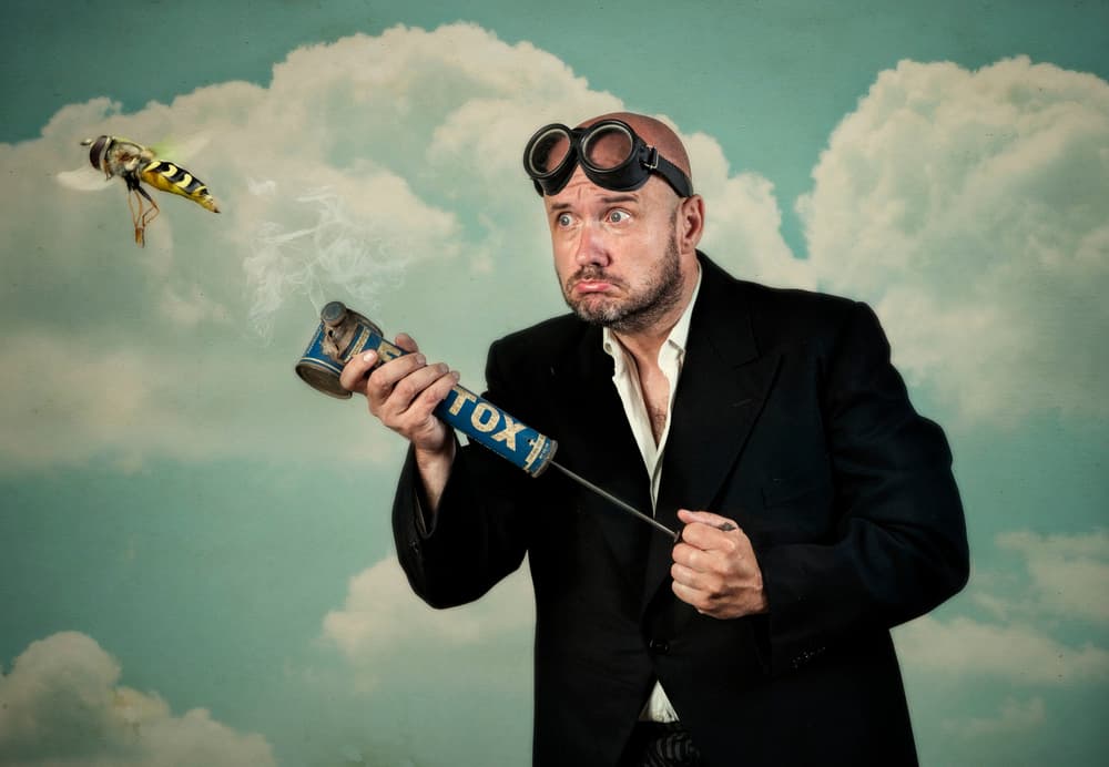 Vintage Bug Spray Man by Monika Vanhercke — canvas wall art
