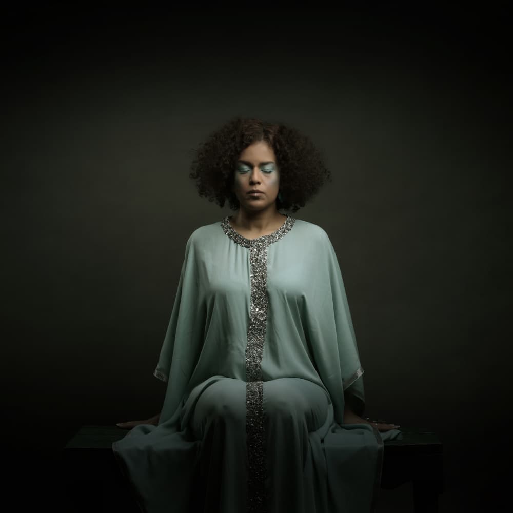 Serene Woman in Teal by Moein Hasheminasab — canvas wall art