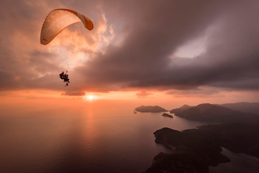 Sunset Paraglider Flight by Tristan Shu — canvas wall art