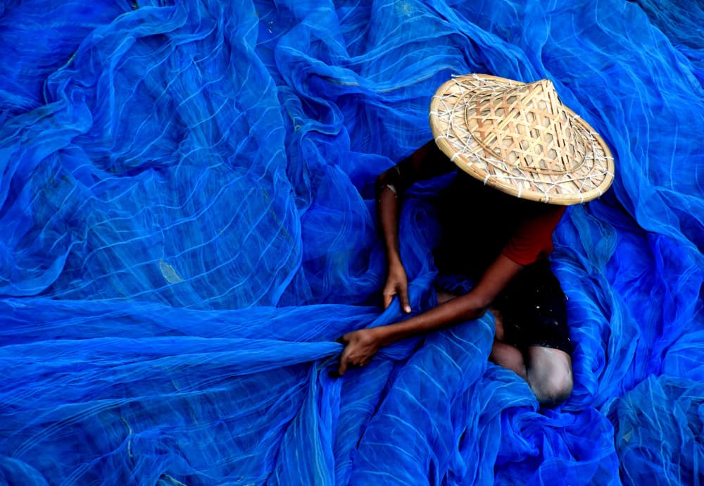 Fisherman's Blue Net by Moumita Mondal — canvas wall art