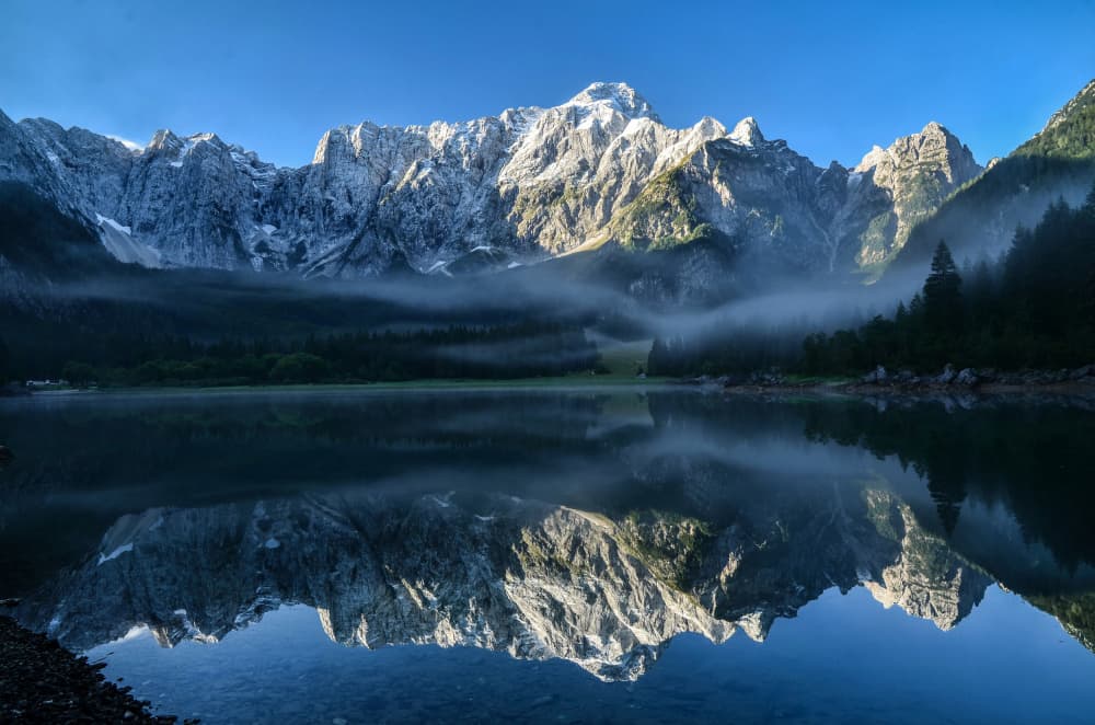 Misty Mountain Lake Reflection by Bojan Kolman — canvas wall art