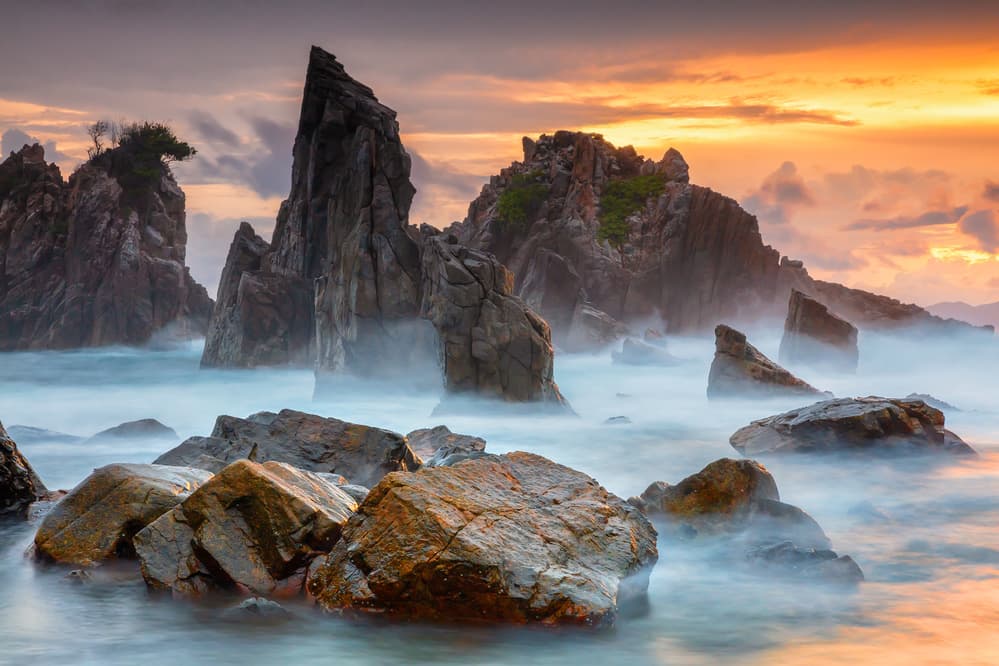 Dramatic Misty Sea Stacks by Gunarto Song — canvas wall art