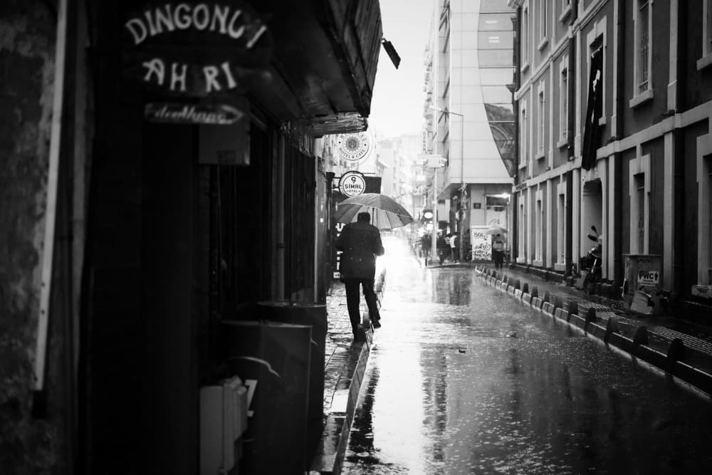 Rainy City Walk by Ali Ayer — canvas wall art