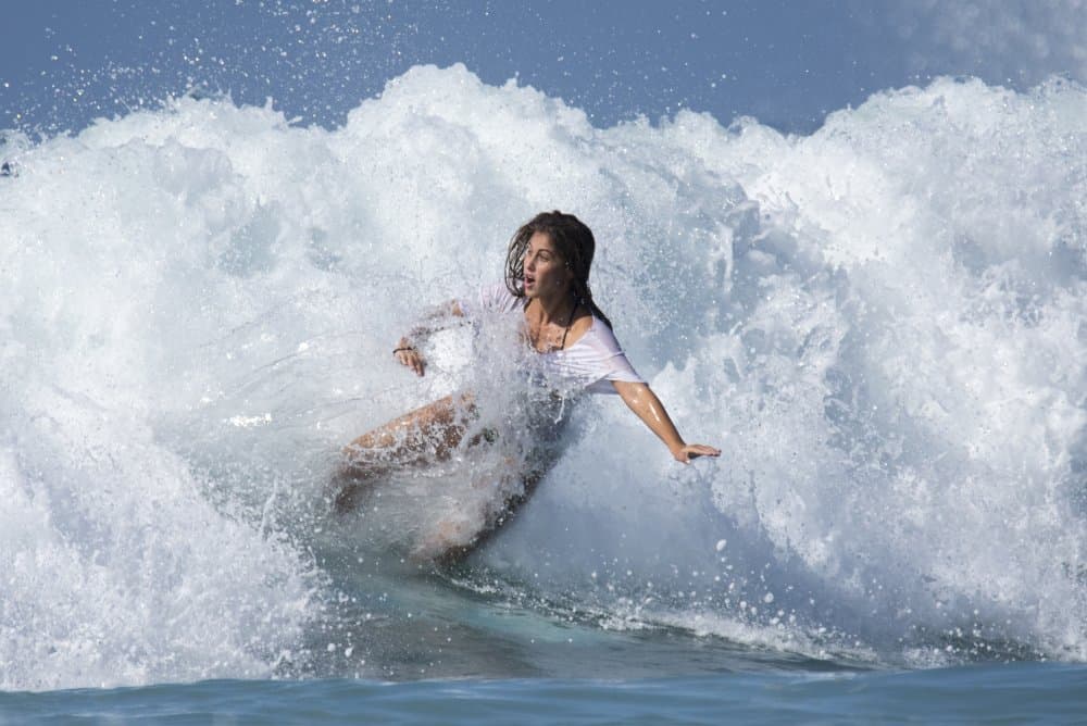 Woman Surfing Wave by Yuval — canvas wall art