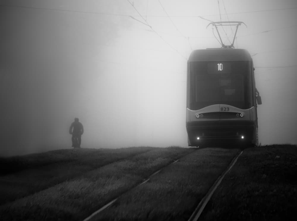 Foggy Tram and Cyclist by Anna Niemiec — canvas wall art