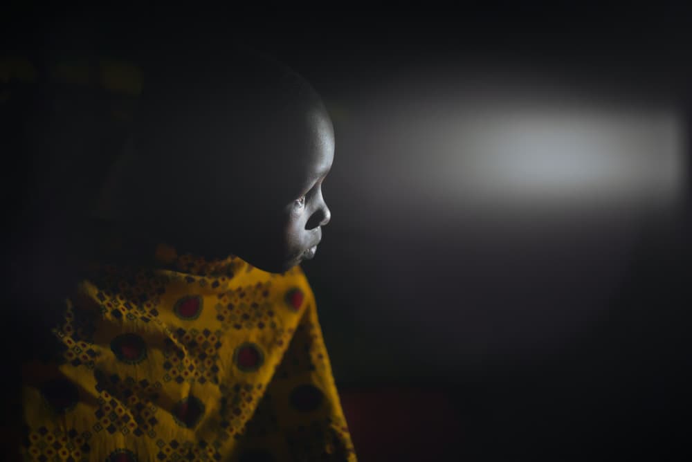 Thoughtful Yellow Child by Mohammed Baqer — canvas wall art