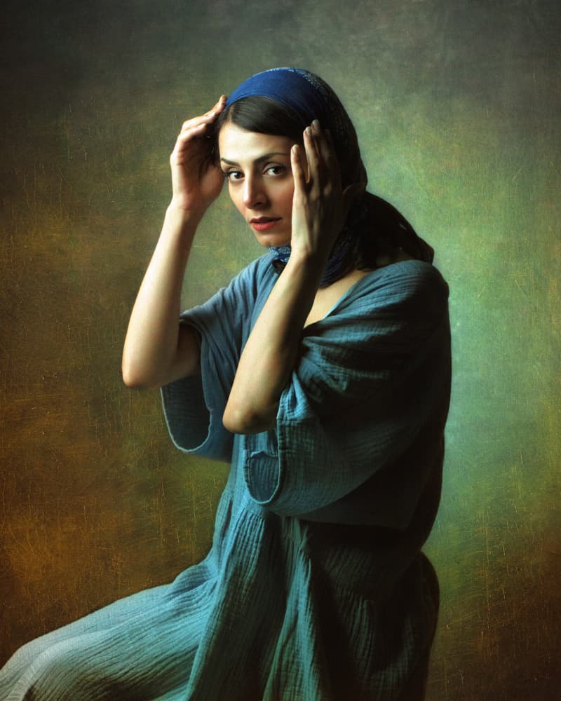 Pensive Woman In Blue by Mehdi Mokhtari — canvas wall art