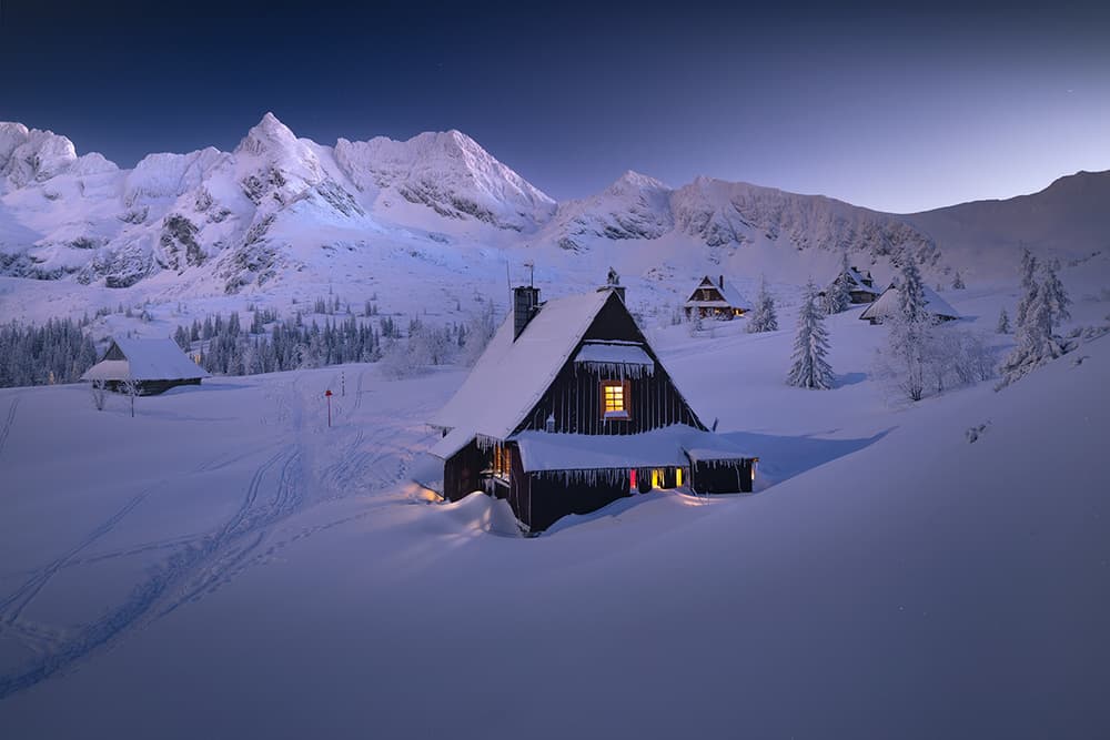 Snowy Mountain Cabins by Karol Nienartowicz — canvas wall art