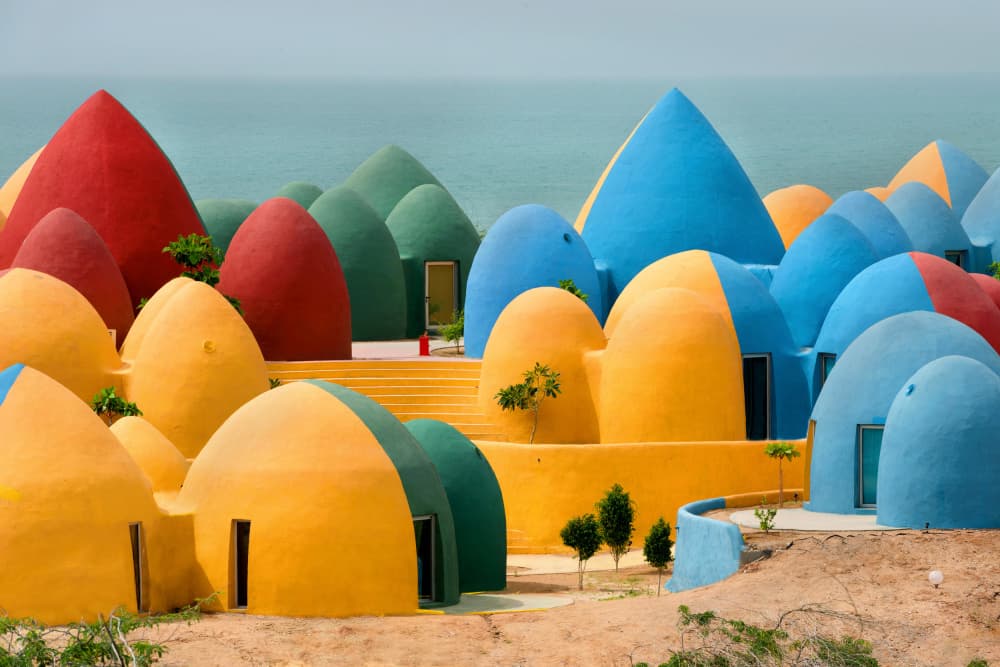 Seaside Fantasy Village by Hossein Nikzad Amoli — canvas wall art