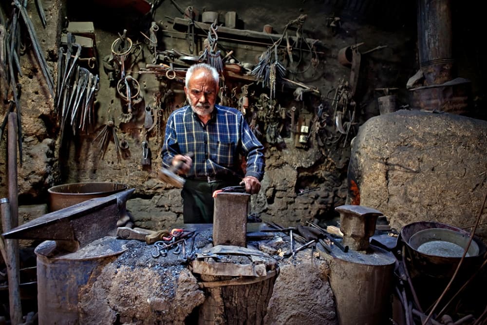 Artisan Blacksmith at Work by Mohammadreza Momeni — canvas wall art
