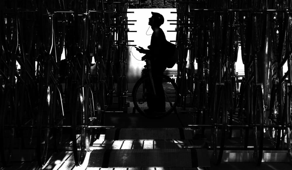 Urban Cyclist's Shadow by Jian Wang — canvas wall art