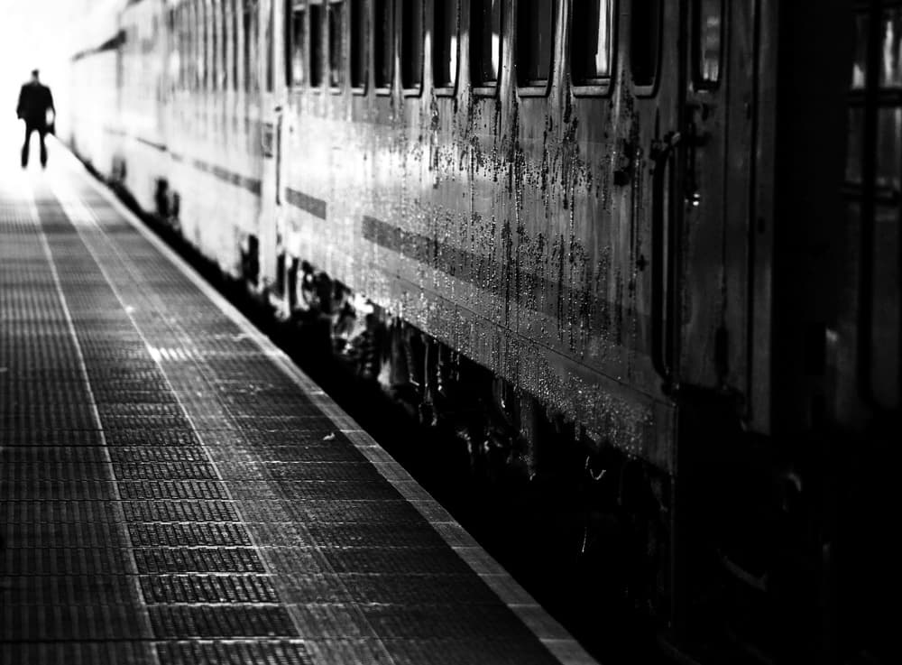 Man on Station Platform by Anna Niemiec — canvas wall art
