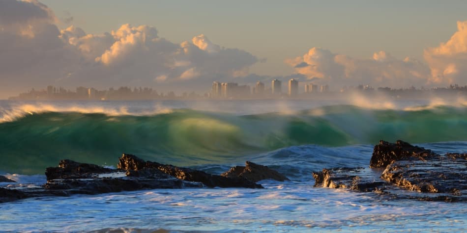 Green Wave City Glow by Mel Brackstone — canvas wall art